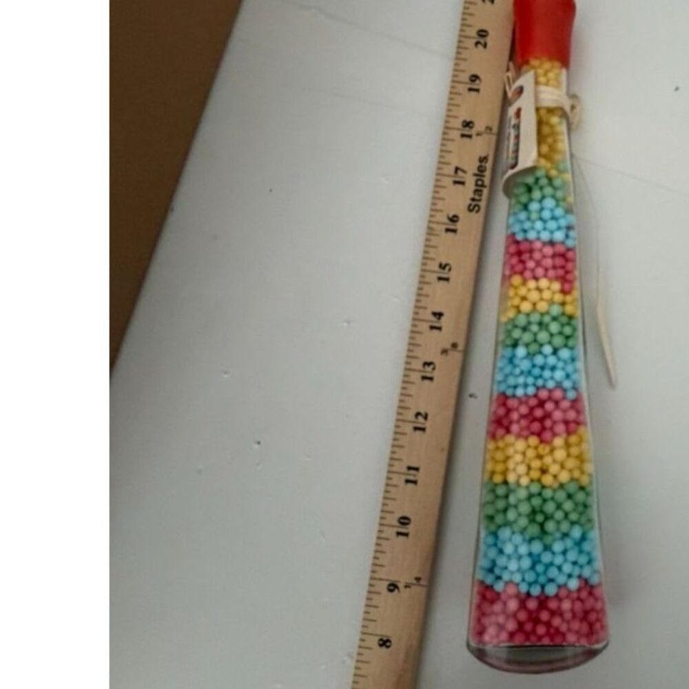 bottle of asst multicolored mini bath beads